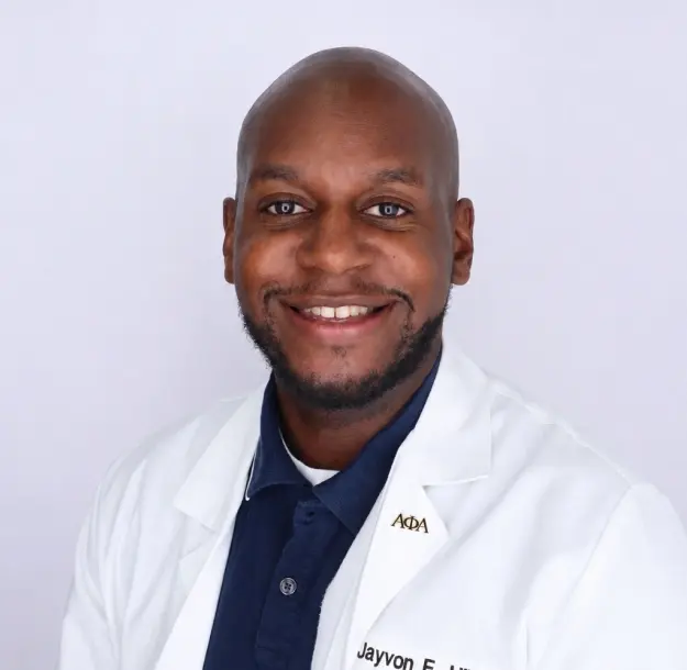 Dr. Jayvon Hibbler, dentist at Memphis dental practice, professional headshot.