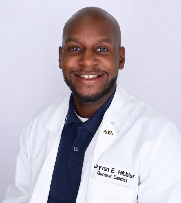 Dr. Jayyon E. Hibbler, General Dentist, smiling in professional portrait.